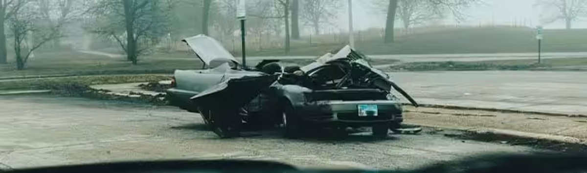 total car wrecked on the street